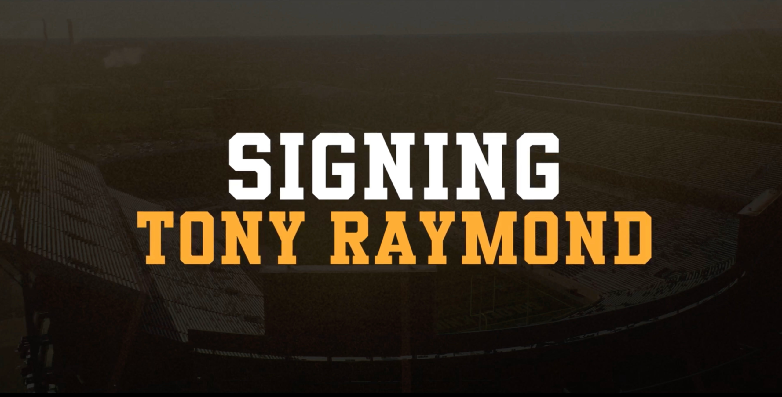 Signing Tony Raymond